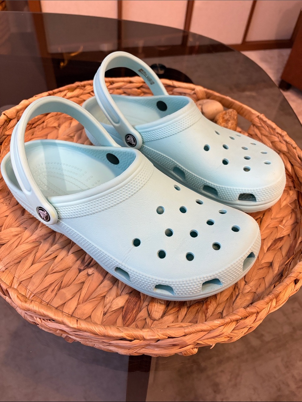 Light blue Crocs women size 10/men size 8 slip on shoes